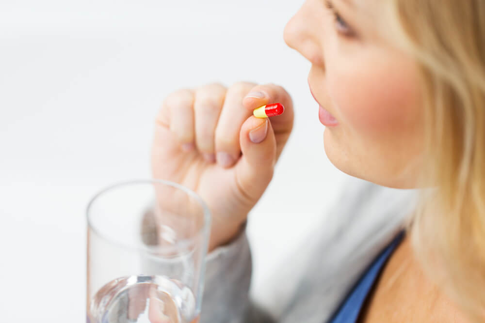 women-taking-medication