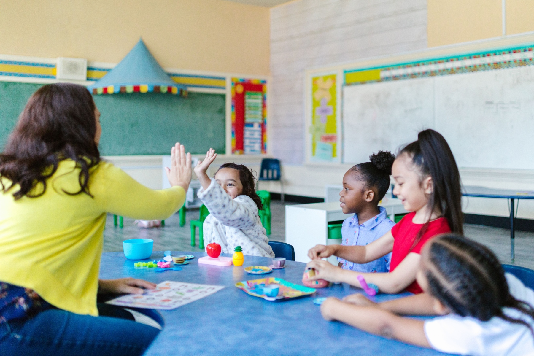 Kids learning and playing in a classroom